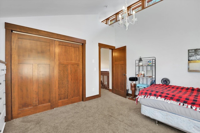 13625 S Sherman Rd, Spokane, WA 99224 - bedroom featuring carpet, a chandelier, and high vaulted ceiling