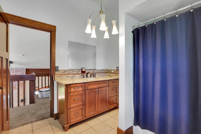 13625 S Sherman Rd, Spokane, WA 99224 - bathroom featuring a chandelier, vanity, tile patterned flooring, and a shower with curtain