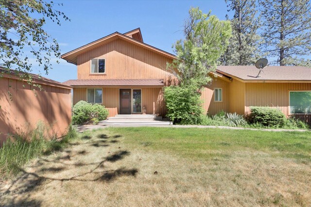13625 S Sherman Rd, Spokane, WA 99224 - rear view of property with a lawn