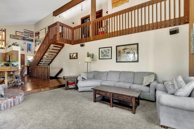 13625 S Sherman Rd, Spokane, WA 99224 - living area with a high ceiling, carpet, and stairway