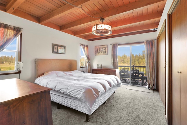 13625 S Sherman Rd, Spokane, WA 99224 - carpeted bedroom with wooden ceiling with exposed beams and access to outside