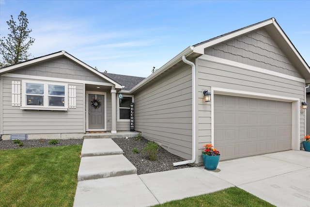 8620 W 8th Ave, Spokane, WA 99224 - single story home featuring a garage, concrete driveway, and a front yard