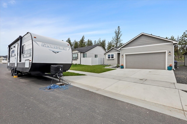 8620 W 8th Ave, Spokane, WA 99224 - view of front of property with concrete driveway and a garage