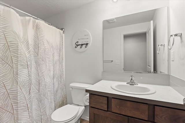 8620 W 8th Ave, Spokane, WA 99224 - bathroom with toilet, vanity, and curtained shower