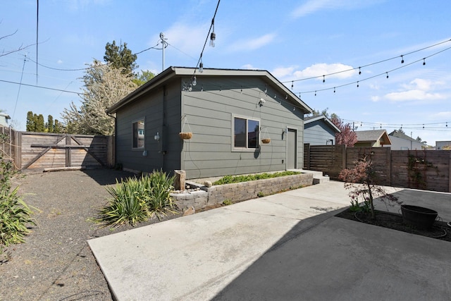 2518 W Bridge Ave, Spokane, WA 99201 - back of house featuring a patio and a fenced backyard