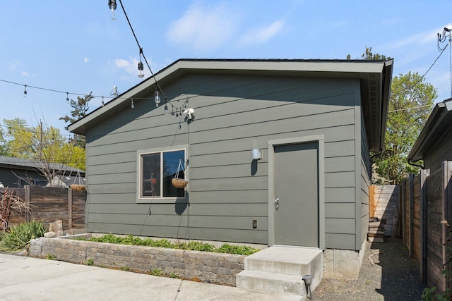 2518 W Bridge Ave, Spokane, WA 99201 - rear view of property with a fenced backyard