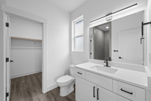 3617 E 1st Ave, Spokane, WA 99202 - full bath featuring vanity, wood finished floors, and a spacious closet
