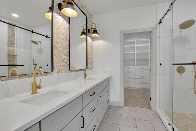 1399 W Findley Ln, Deer Park, WA 99006 - full bathroom with tile patterned floors, a shower stall, double vanity, and a walk in closet