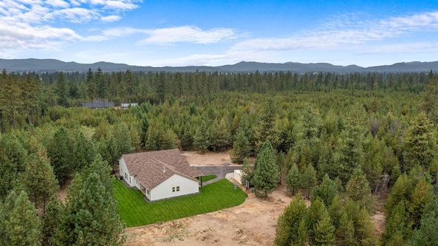 1399 W Findley Ln, Deer Park, WA 99006 - aerial view of property and surrounding area featuring a forest and a mountainous background