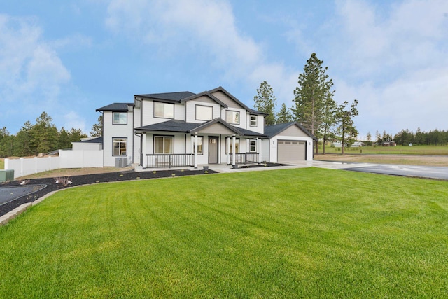 5125 N Ellie Ln, Spokane, WA 99217 - view of front of house featuring covered porch, driveway, and a detached garage