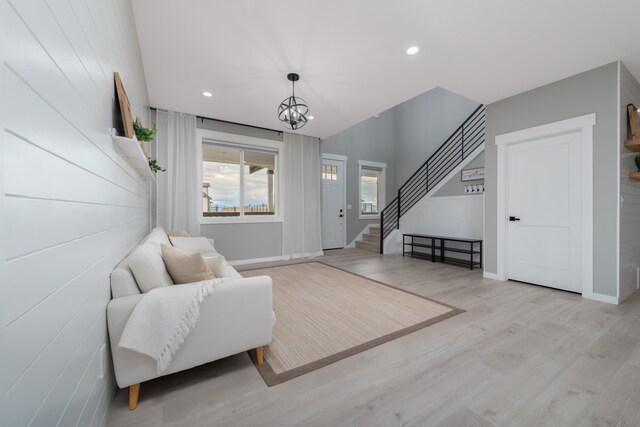 5125 N Ellie Ln, Spokane, WA 99217 - living area featuring stairway, light wood-style flooring, baseboards, recessed lighting, and a chandelier