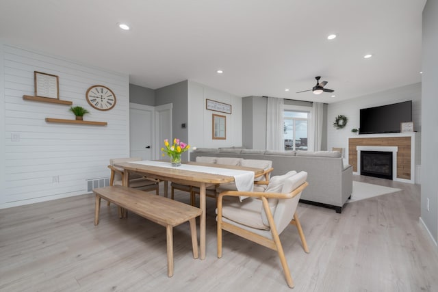 5125 N Ellie Ln, Spokane, WA 99217 - dining area featuring light wood-type flooring, a fireplace, ceiling fan, and recessed lighting