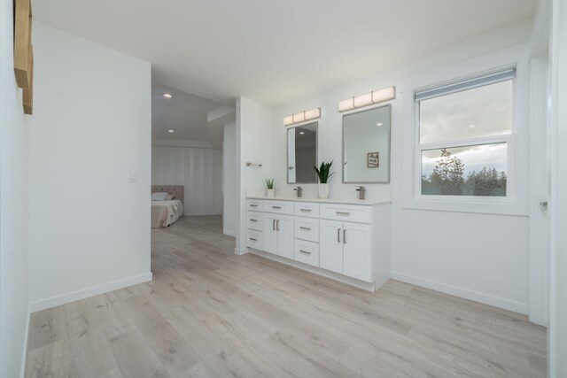 5125 N Ellie Ln, Spokane, WA 99217 - full bath featuring double vanity, ensuite bath, wood finished floors, baseboards, and recessed lighting
