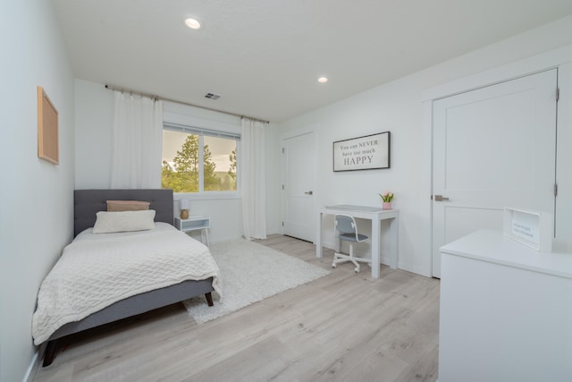 5125 N Ellie Ln, Spokane, WA 99217 - bedroom with light wood finished floors, recessed lighting, and baseboards