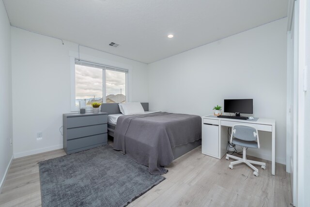 5125 N Ellie Ln, Spokane, WA 99217 - bedroom with light wood finished floors, baseboards, a desk, and recessed lighting