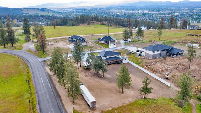 5125 N Ellie Ln, Spokane, WA 99217 - aerial view of sparsely populated area featuring a mountain backdrop