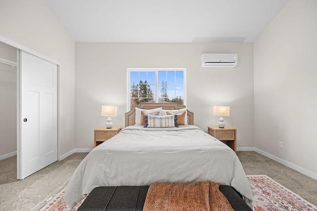 202 S Union Road Building B, Unit 102, Spokane, WA 99206 - bedroom featuring an AC wall unit, light carpet, baseboards, and a closet