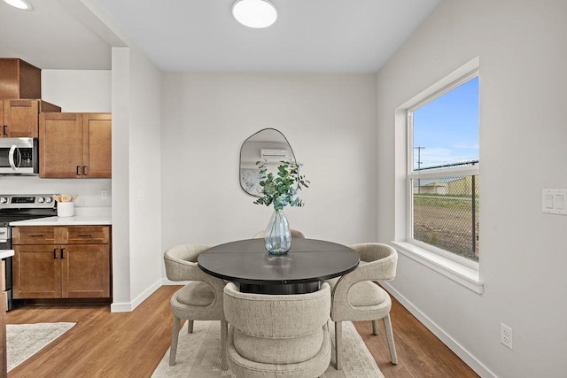 202 S Union Road Building B, Unit 102, Spokane, WA 99206 - dining room featuring light wood-style flooring and baseboards