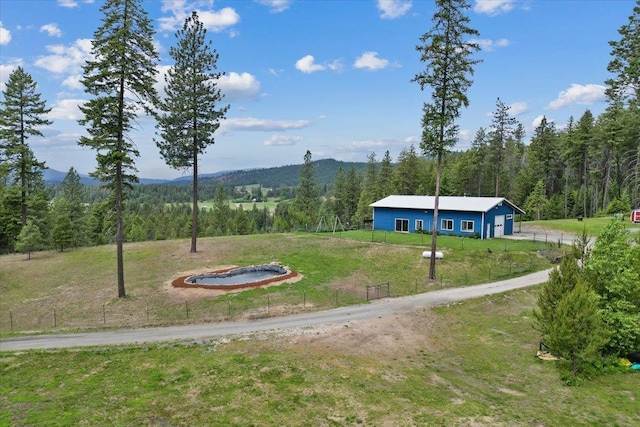 2559F United Copper Mine Rd, Chewelah, WA 99109 - view of yard featuring a view of trees and a mountain view