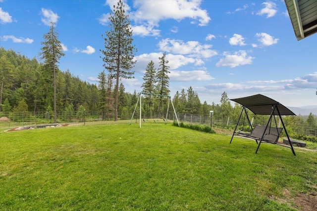 2559F United Copper Mine Rd, Chewelah, WA 99109 - view of yard featuring a forest view