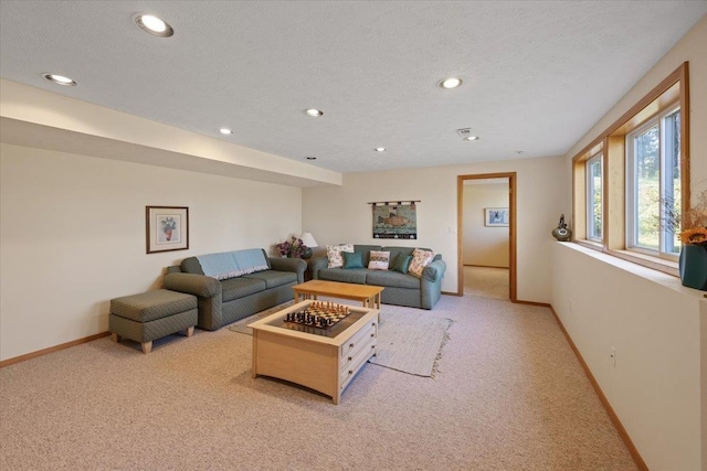 14410 E 45th Ct, Veradale, WA 99037 - living room featuring light carpet, baseboards, recessed lighting, and a textured ceiling
