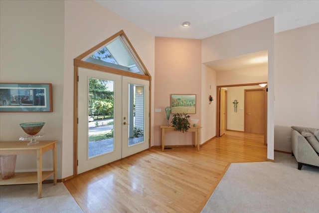 14410 E 45th Ct, Veradale, WA 99037 - foyer entrance featuring light wood finished floors, a high ceiling, french doors, and baseboards