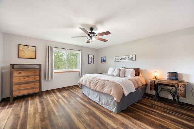 39810 N Hardesty Ln, Elk, WA 99009 - bedroom featuring wood finished floors, a ceiling fan, and baseboards