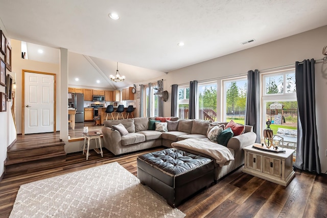 39810 N Hardesty Ln, Elk, WA 99009 - living area featuring a chandelier, dark wood-style floors, healthy amount of natural light, recessed lighting, and lofted ceiling