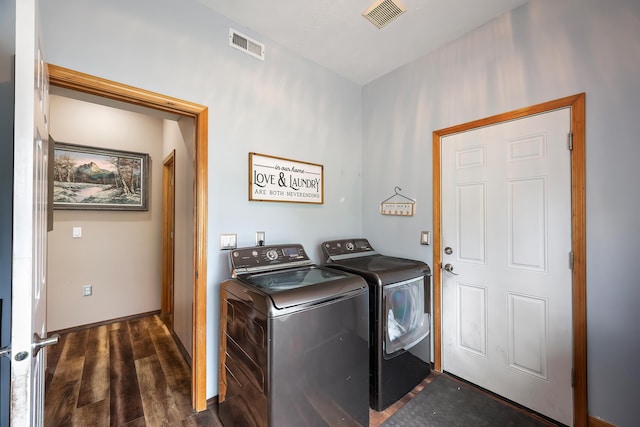 39810 N Hardesty Ln, Elk, WA 99009 - washroom with independent washer and dryer, dark wood-style flooring, and baseboards