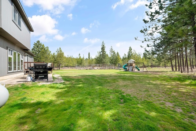 39810 N Hardesty Ln, Elk, WA 99009 - view of yard featuring a playground and a patio area