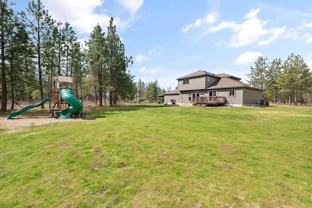 39810 N Hardesty Ln, Elk, WA 99009 - view of grassy yard featuring a wooden deck