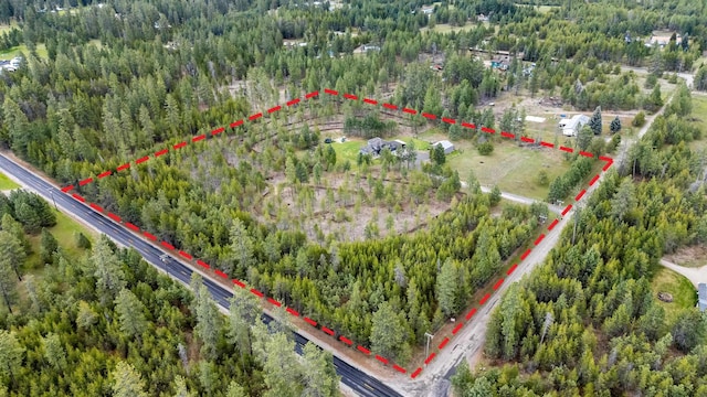 39810 N Hardesty Ln, Elk, WA 99009 - aerial view of property's location with property boundaries highlighted and a heavily wooded area