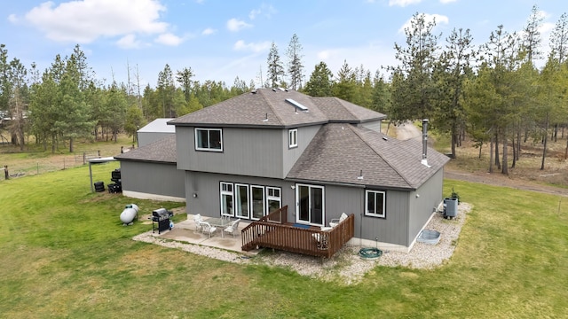 39810 N Hardesty Ln, Elk, WA 99009 - back of property with a shingled roof, central AC, a wooden deck, and a patio
