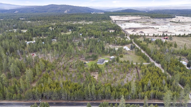 39810 N Hardesty Ln, Elk, WA 99009 - aerial view of property's location featuring a forest and mountains