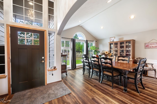 39810 N Hardesty Ln, Elk, WA 99009 - dining space with wood finished floors, arched walkways, and high vaulted ceiling