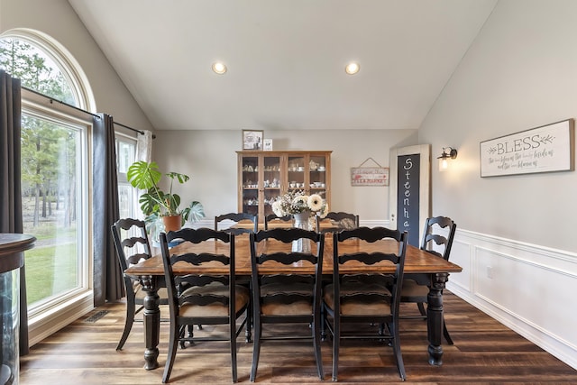 39810 N Hardesty Ln, Elk, WA 99009 - dining area with lofted ceiling, dark wood-style flooring, a wainscoted wall, and recessed lighting
