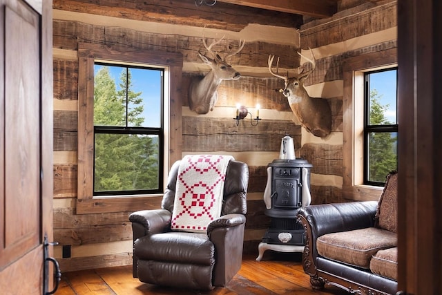 4165 S Varnum Pr, Coeur D Alene, ID 83814 - living area featuring wood-type flooring and beamed ceiling