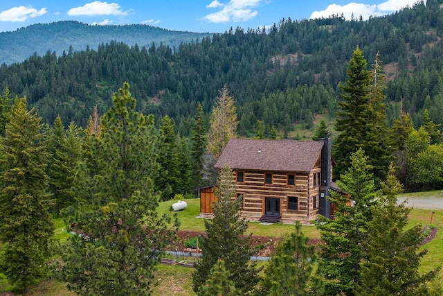 4165 S Varnum Pr, Coeur D Alene, ID 83814 - view of subject property with a heavily wooded area and mountains