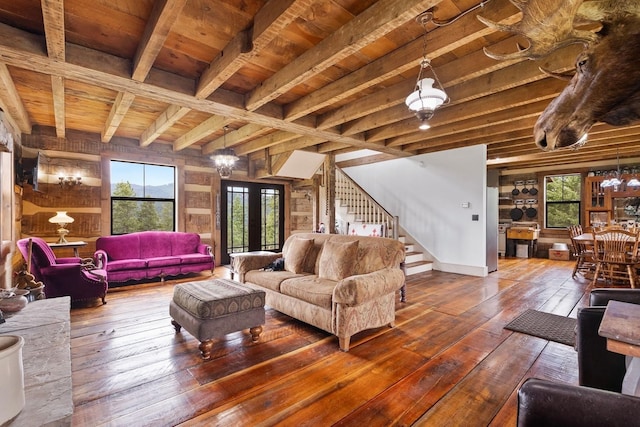 4165 S Varnum Pr, Coeur D Alene, ID 83814 - living area featuring wood-type flooring, wooden ceiling with exposed beams, stairway, wooden walls, and a chandelier