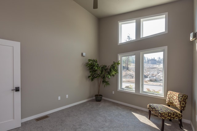 207 E Wandermere Heights Ln, Spokane, WA 99208 - unfurnished room featuring healthy amount of natural light, carpet flooring, ceiling fan, and baseboards