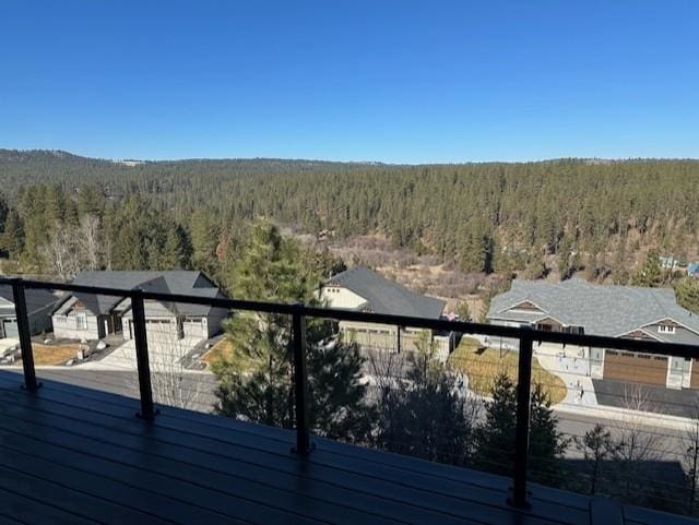 207 E Wandermere Heights Ln, Spokane, WA 99208 - wooden deck with a view of trees