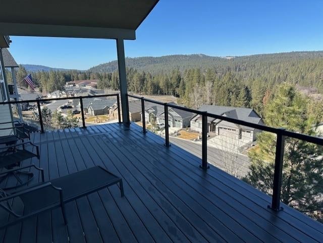 207 E Wandermere Heights Ln, Spokane, WA 99208 - deck with a wooded view and a mountain view