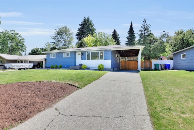 6914 N Jefferson St, Spokane, WA 99208 - view of front of property with concrete driveway and a carport
