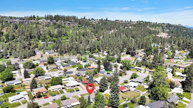 6914 N Jefferson St, Spokane, WA 99208 - aerial view of property and surrounding area featuring a forest and nearby suburban area
