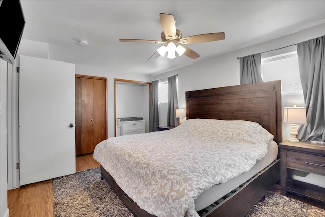 6914 N Jefferson St, Spokane, WA 99208 - bedroom with two closets, light wood finished floors, and ceiling fan