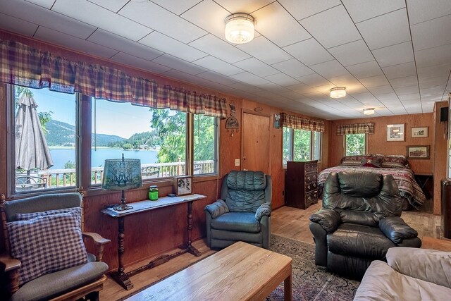2948 Deep Lake Boundary Rd, Colville, WA 99114 - living room featuring light wood-style floors and wood walls