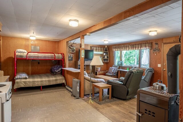 2948 Deep Lake Boundary Rd, Colville, WA 99114 - bedroom with wooden walls and wood finished floors
