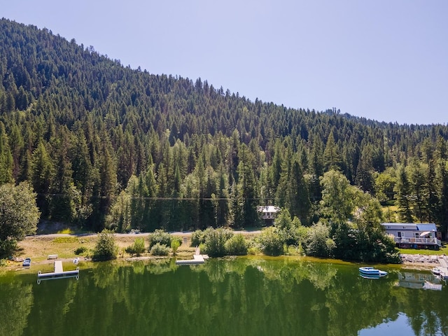 2948 Deep Lake Boundary Rd, Colville, WA 99114 - aerial overview of property's location with a heavily wooded area and a nearby body of water
