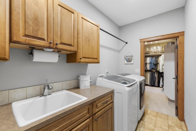 6595D Lois Way, Nine Mile Falls, WA 99026 - laundry area featuring cabinet space and washer and clothes dryer