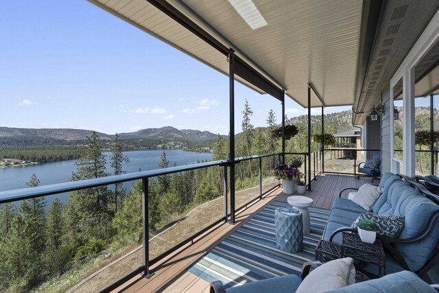 6595D Lois Way, Nine Mile Falls, WA 99026 - sunroom featuring a water and mountain view